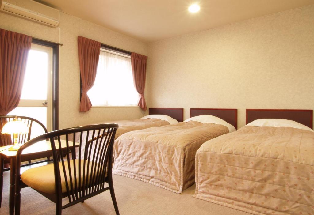 Akakura Yours Inn Мьоко Номер фото