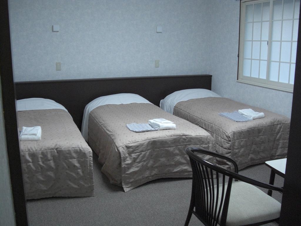 Akakura Yours Inn Мьоко Екстер'єр фото